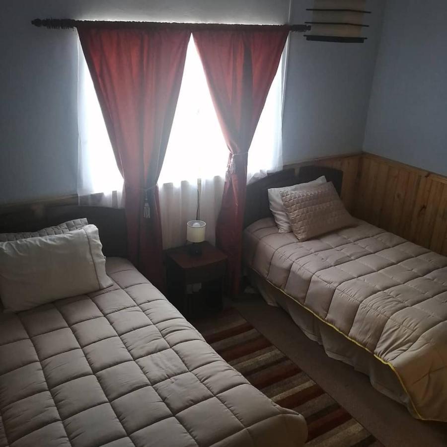 Hostal Y Cabanas Vientos Del Sur Puerto Ingeniero Ibanez Екстериор снимка